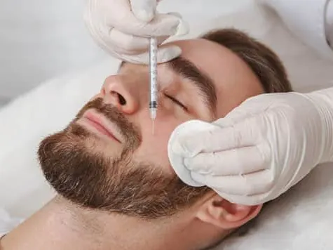 man getting sculptra treatment on the face