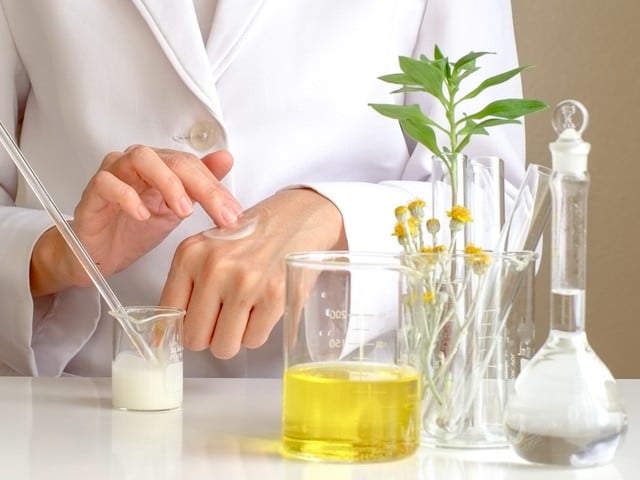 dermatologist testing the organic natural cosmetic product in the laboratory